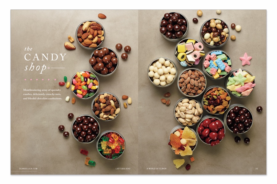 Spread of 18 circular tins filled with colorful candies including gummy bears, chocolates and dried fruits.